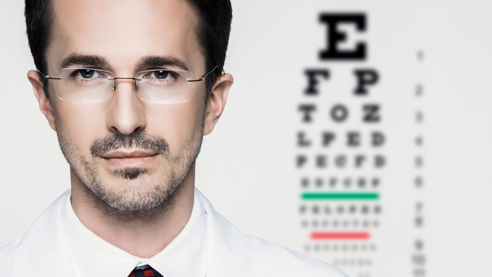 Eye Doctor Assessing Daily Supplement Progress